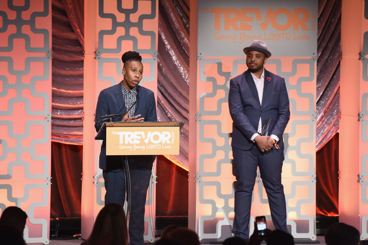Lena Waithe accepts the Hero Award from Justin Simien onstage during TrevorLIVE NYC.