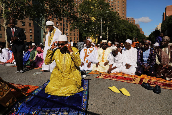 Muslims participate in an outdoor prayer event at Masjid Aqsa-Salam mosque, an annual&nbsp;gathering in Harlem that attracts 