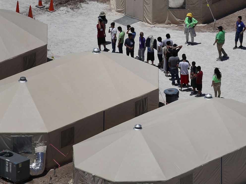 PHOTO: Children and workers are seen at a tent encampment recently built near the Tornillo Port of Entry on June 19, 2018 in Tornillo, Texas.
