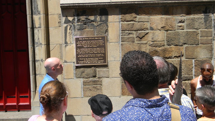 A plaque memorializes the site of the first PFLAG meeting at the Church of the Village on March 11, 1973.