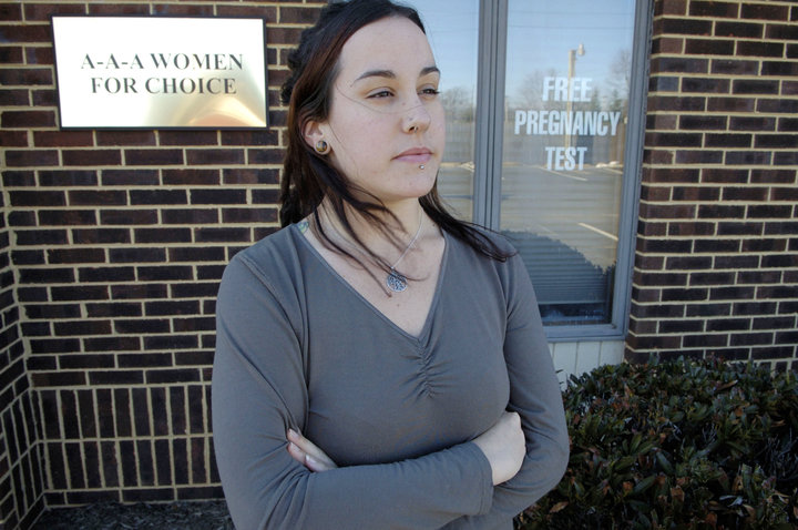 Allyson Kirk, 24, stands outside the A-A-A Women For Choice clinic, a crisis pregnancy center, March 2, 2007, in Manassas, Vi