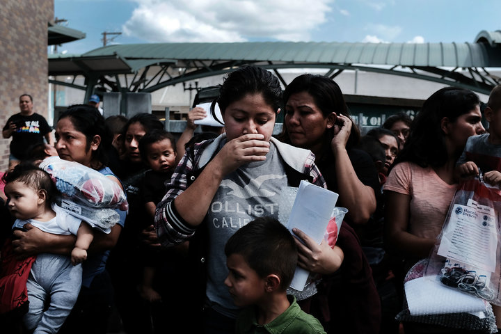 Dozens of women and children, many fleeing poverty and violence in Honduras, Guatemala and El Salvador, arrive at a bus stati