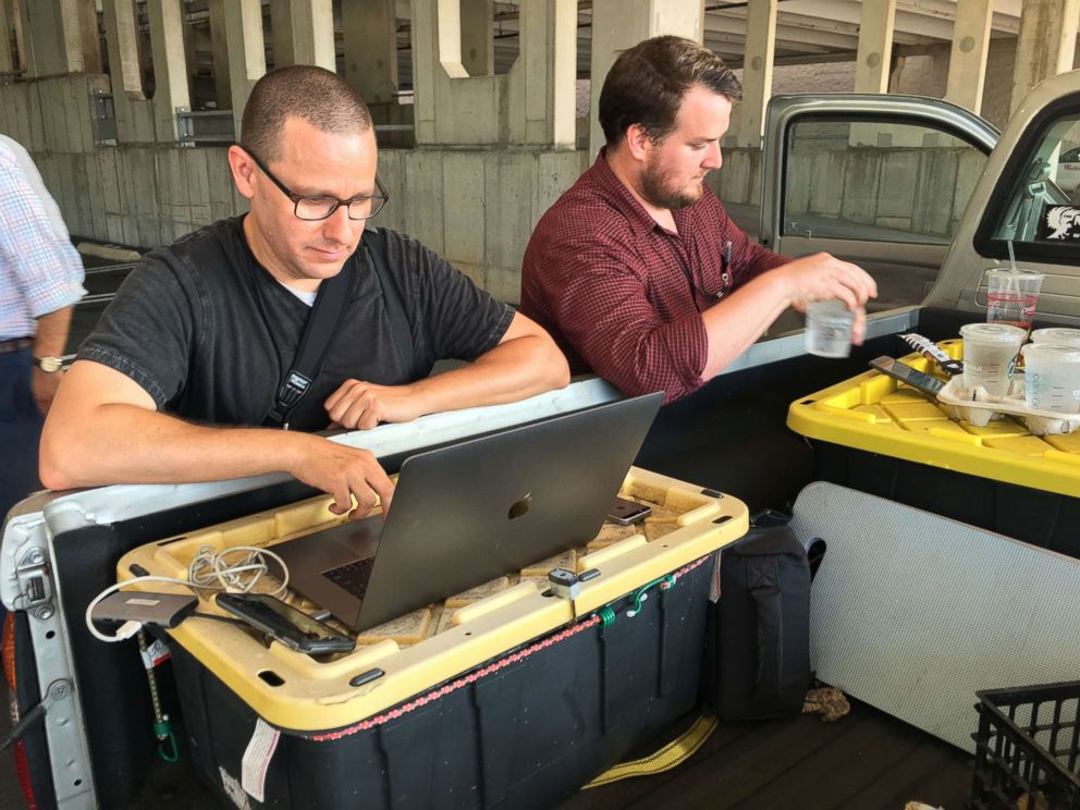 PHOTO: Capital Gazette reporter Chase Cook and photographer Joshua McKerrow work on the next days newspaper while awaiting news from their colleagues in Annapolis, Maryland, June 28, 2018.