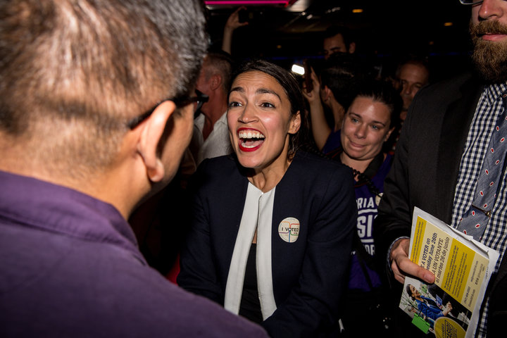 Alexandria Ocasio-Cortez celebrates with supporters at a victory party in the Bronx.