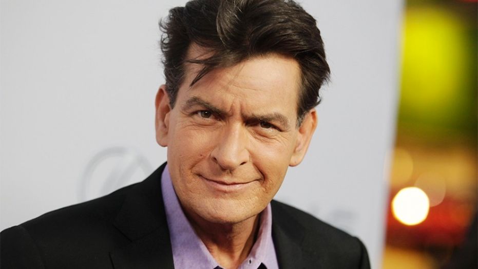 Charlie Sheen was spotted on social media with rapper Lil Pump wearing a lab coat and flashy jewelry on the set of what appears to be an upcoming video shoot.