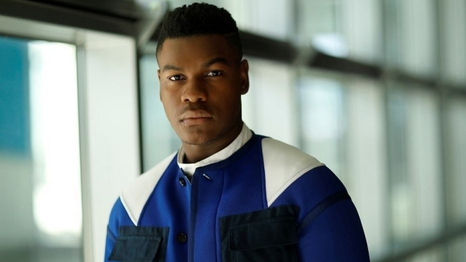 John Boyega urged "Star Wars" fans to stop harassing his costars after one actress left social media due to online bullying.