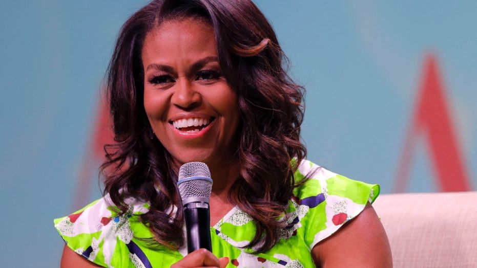 Former first lady Michelle Obama speaks at the American Library Association annual conference in New Orleans, Friday, June 22, 2018. (AP Photo/Gerald Herbert)