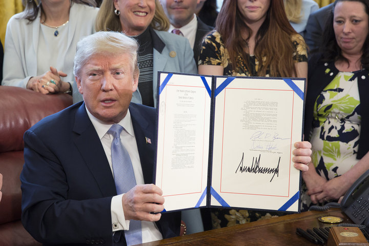 President Donald Trump signs FOSTA/SESTA on April 11, 2018.