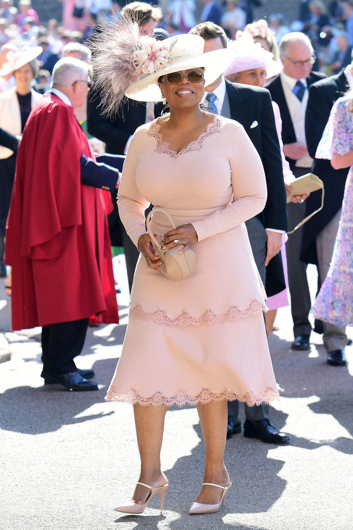 Her Majesty Oprah Winfrey arrives at St. George's Chapel at Windsor Castle for the royal wedding.