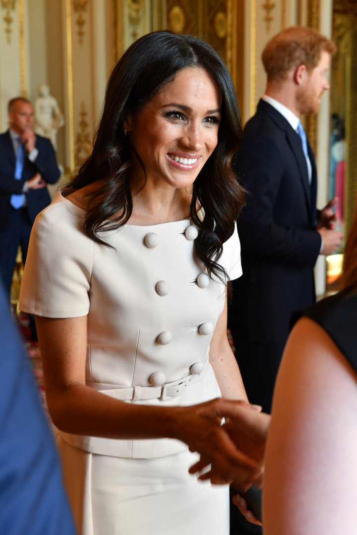 Markle meeting a group of the Queen's Young Leaders on June 26.&nbsp;