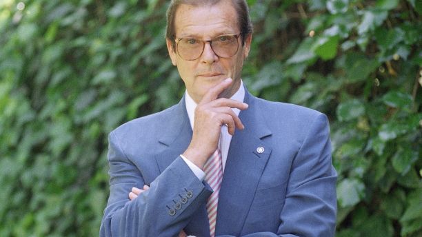 FILE - This is a April 22, 1996   file photo of veteran British actor Roger Moore, poses for a portrait,  in the Studio City section of Los Angeles.  Roger Moore's family said Tuesday May 23, 2017 that the  former James Bond star has died after a short battle with cancer Ã¯Â»Â¿(AP Photo/Chris Pizzello/ File)