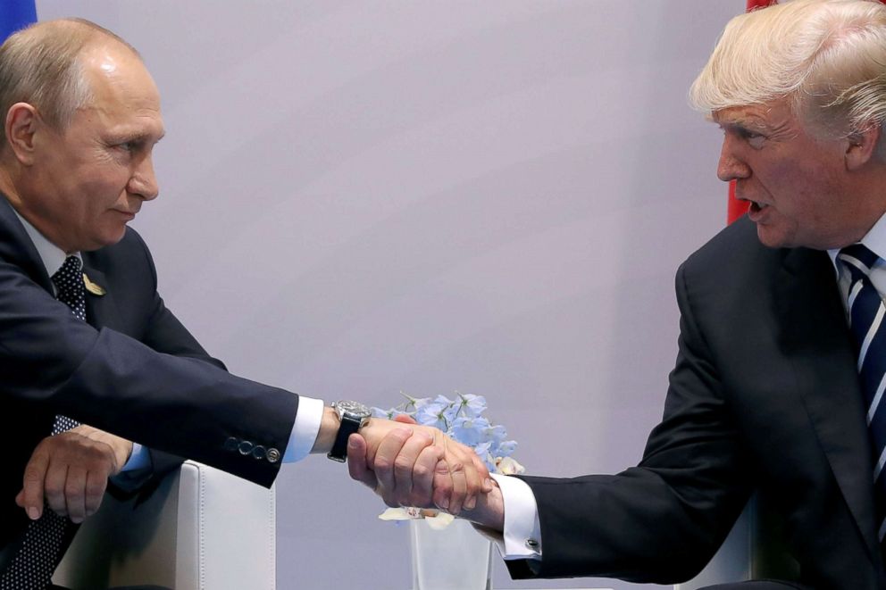 PHOTO: Russian President Vladimir Putin shakes hands with President Donald Trump during the their bilateral meeting at the G20 summit in Hamburg, Germany, July 7, 2017. 