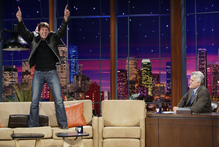 Tom Cruise stands on a couch, something he likes to do, during an interview on "The Tonight Show with Jay Leno" in 2005.