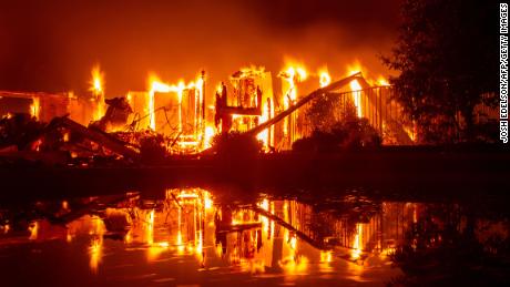 Flames engulf a home in Redding, California.