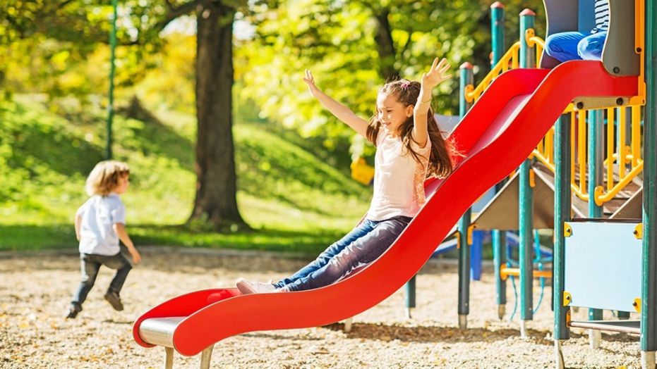 Children playing at a playground.