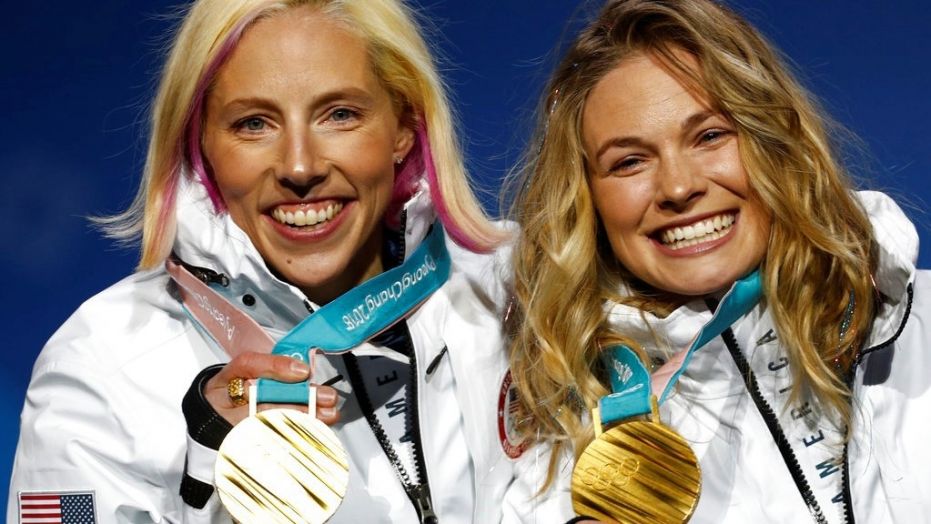 Randall, left, and her teammate, Jessica Diggins, made history by becoming the first-ever American women to medal in a cross-country Olympic skiing event. 