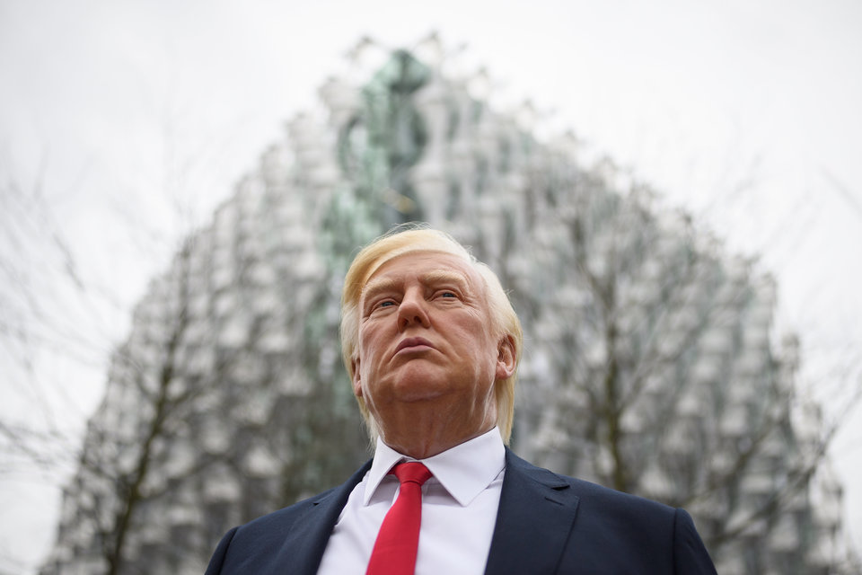 A model of President Donald Trump from Madame Tussauds waxwork attractions stands&nbsp;outside the new U.S. Embassy in London