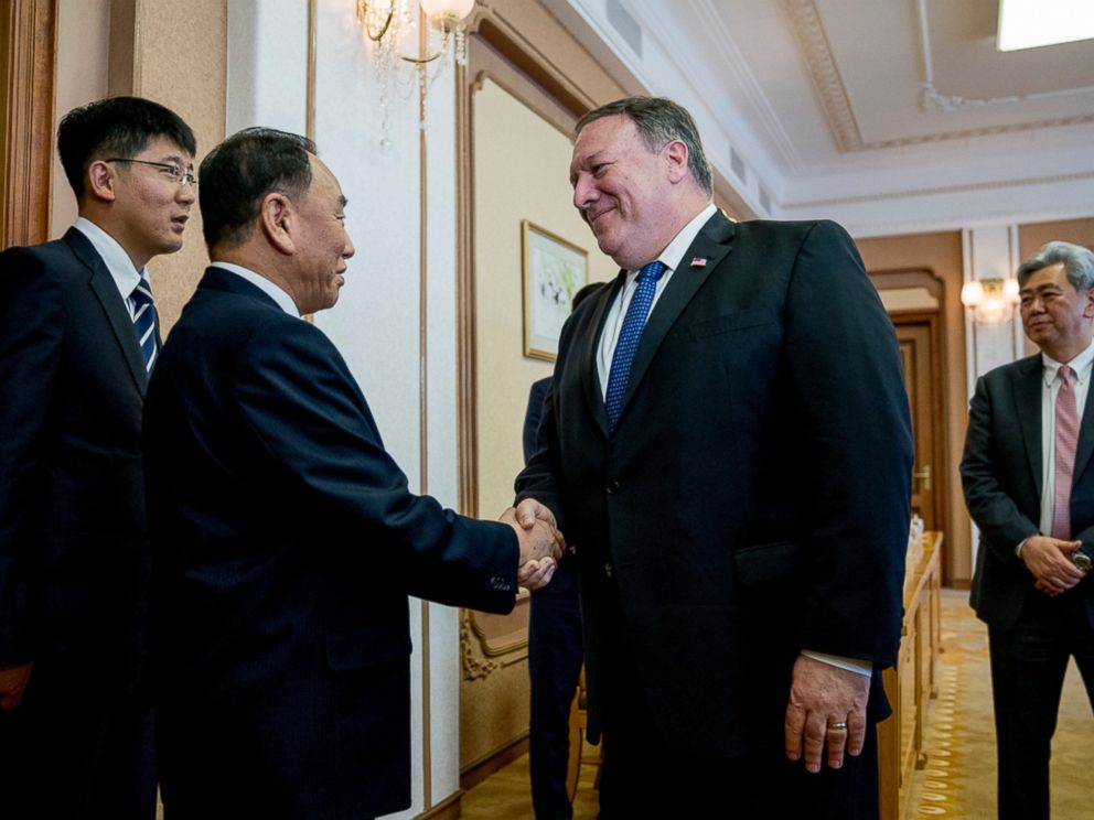 U.S. Secretary of State Mike Pompeo, second from right, greets Kim Yong Chol, second from left, a North Korean senior ruling party official and former intelligence chief, as they arrive for a meeting at the Park Hwa Guest House in Pyongyang, North Ko