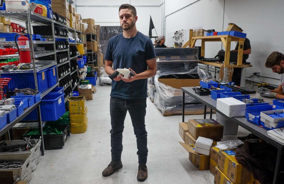 PHOTO: Cody Wilson, owner of Defense Distributed company, holds a 3D printed gun, called the Liberator, in his factory in Austin, Texas, Aug. 1, 2018.