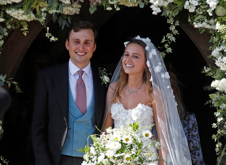 Daisy Jenks and Charlie Van Straubenzee emerge from the church after their wedding.&nbsp;<i></i>