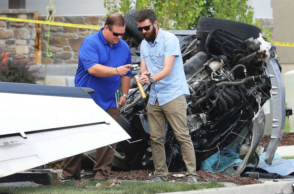 PHOTO: Federal Aviation Administration officials investigate the scene of a plane crash in Payson, Utah, Aug. 13, 2018.