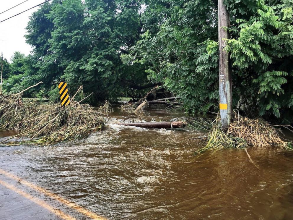 In this photo provided by Jessica Henricks, is flooding and damage from Hurricane Lane Friday, Aug. 24, 2018, near Hilo, Hawaii.