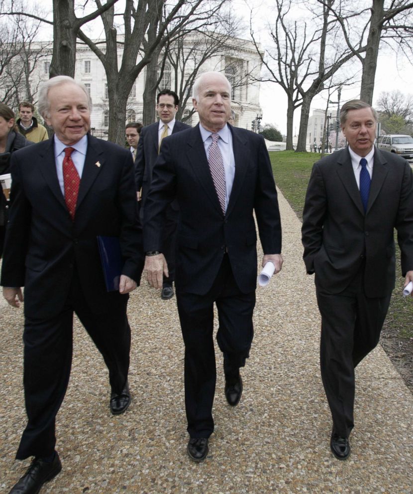 PHOTO: Senator John McCain (C) arrives with US Sen. Joe Lieberman (I-CT) and Sen. Lindsey Graham(R) R-SC at a Vets for Freedom rally on Capitol Hill, April 8, 2008.