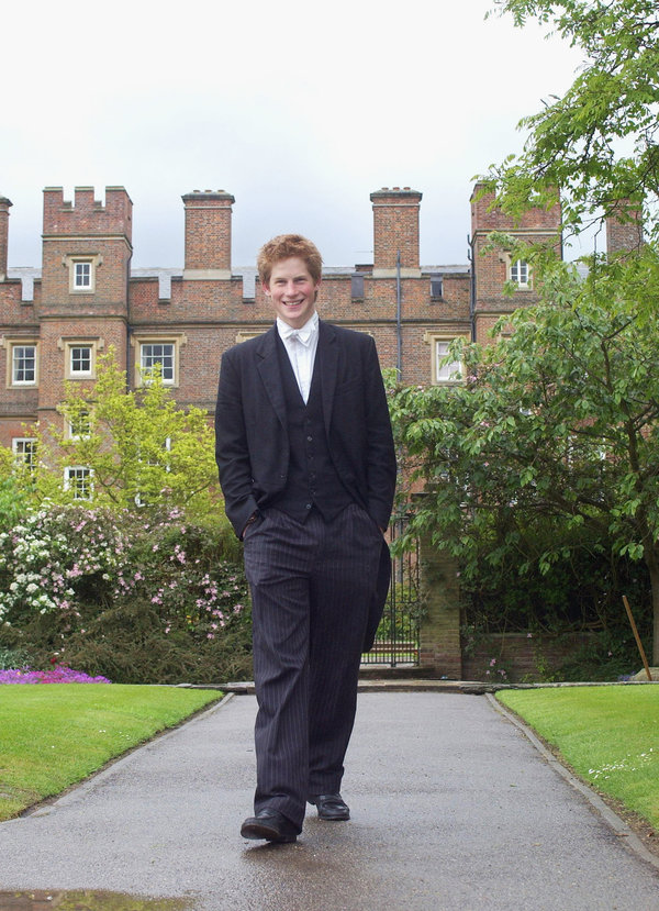 Prince Harry wearing his school dress, which consists of a black tailcoat, a waistcoat and pin-striped trousers, in March 200