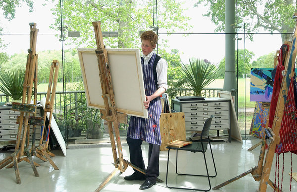 Prince Harry poses painting in the Drawing Room at Eton College on May 12, 2003.&nbsp;