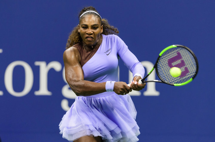 Serena Williams muscles up on a shot in her straight-set victory Wednesday.