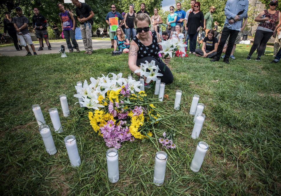 A vigil is held in Charlottesville's McGuffey Park for the victim killed by a car following the Unite the Right rally on Aug.