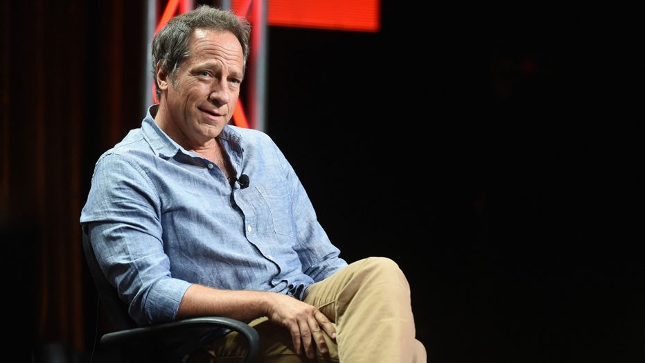 LOS ANGELES, CA - JULY 10:  Actor Mike Rowe speaks during the "Somebody's Gotta Do It" portion of the 2014 TCA Turner Broadcasting Summer Press Tour Presentation at The Beverly Hilton on July 10, 2014 in Los Angeles, California.  (Photo by Michael Buckner/WireImage)