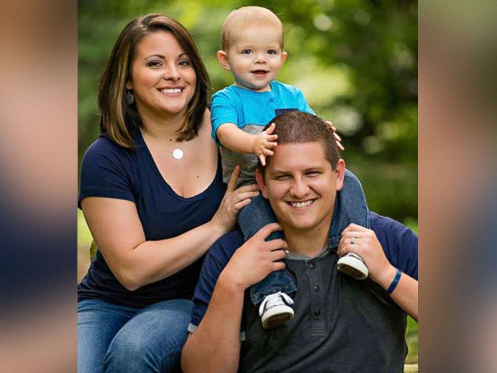 PHOTO: Undated family photo of Taylor Robertson posing with his wife, Holly, and their young son. Robertson was killed Sunday, Aug. 26, 2018, during a shooting at a video game tournament in Jacksonville, Fla.