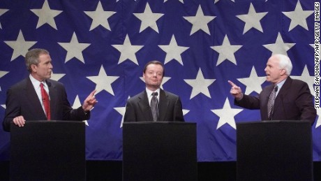 Republican Presidential nomination hopefuls (L-R) George W. Bush, Gary Bauer, and John McCain debate in January 2000.