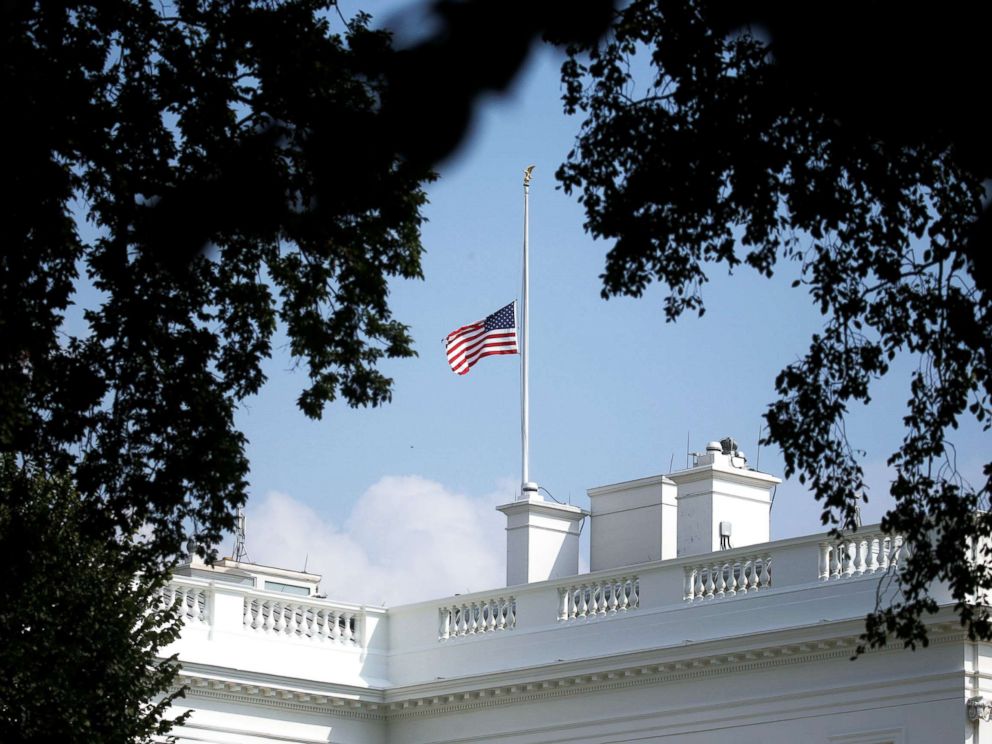 PHOTO: The White House flag is seen after being returned to half-staff in honor of Senator John McCain at the White House, Aug. 26, 2018.