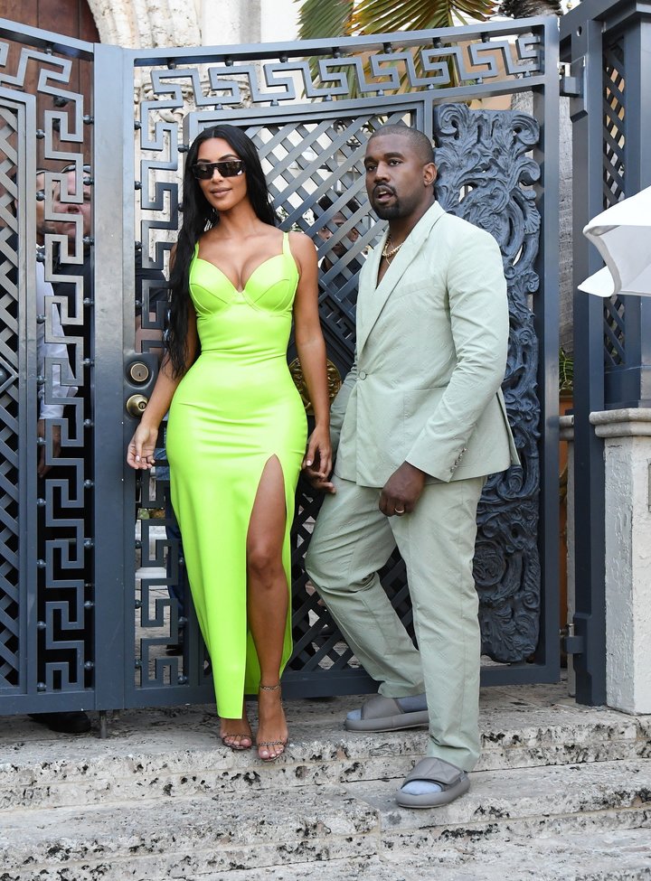 Kim Kardashian and Kanye West in Miami at a wedding on Saturday.