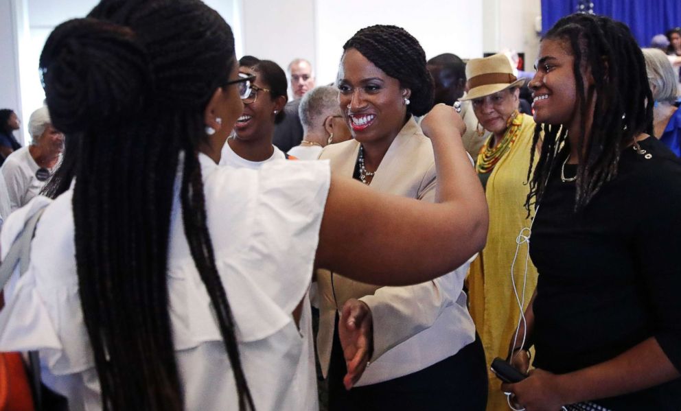 PHOTO: Boston City Councilor Ayanna Pressley, center, who is challenging Rep. Michael Capuano, is surrounded by supporters following a debate at the University of Massachusetts, in Boston, Aug. 7, 2018.