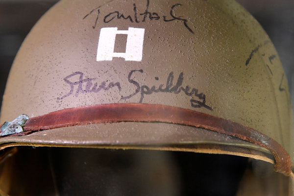 A detail of Capt. Miller&rsquo;s helmet, worn by Tom Hanks and signed by him and director Steven Spielberg, from 1998&rsquo;s