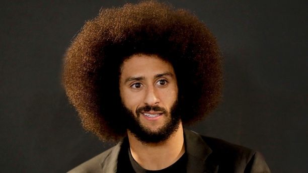 FILE - In this Dec. 24, 2016, file photo San Francisco 49ers quarterback Colin Kaepernick talks during a news conference after an NFL football game against the Los Angeles Rams. The free agent quarterback was named GQ magazine's "Citizen of the Year" for his activism on Nov. 13, 2017. (AP Photo/Rick Scuteri, File)