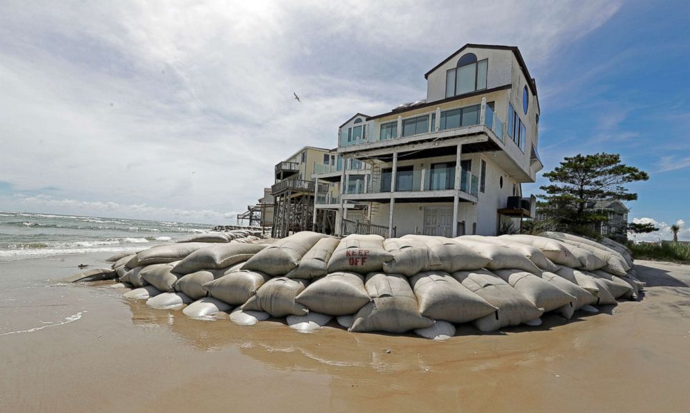 PHOTO: Sand bags surround homes on North Topsail Beach, N.C., Sept. 12, 2018, as Hurricane Florence threatens the coast.