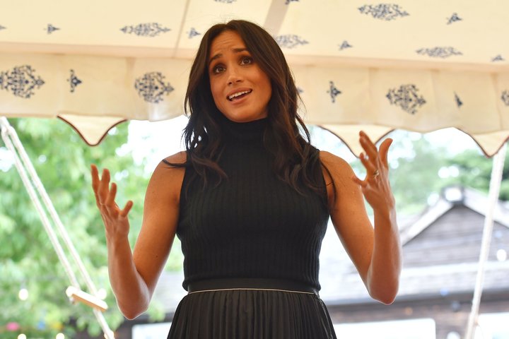 Meghan speaking to the guests at the cookbook event.&nbsp;