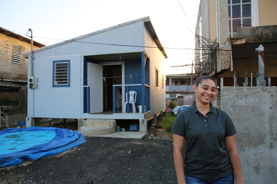 A year later, Acevedo is chipper as she talks about her new home. Built by a nonprofit organization, the house sits next door