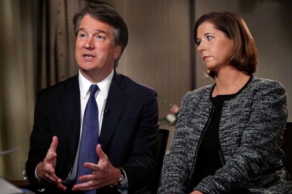 PHOTO: Brett Kavanaugh, sitting with his wife Ashley Estes Kavanaugh, answers questions during a FOX News interview on Sept. 24, 2018, in Washington.