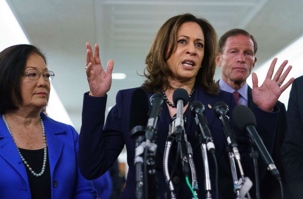Democratic Sen. Kamala Harris, joined from left by, Sen. Mazie Hirono, D-Hawaii, and Sen. Richard Blumenthal, D-Conn., speaks to media about the Judiciary Committee hearing on Supreme Court nominee Judge Brett Kavanaugh in Washington, Sept. 28, 2018. 