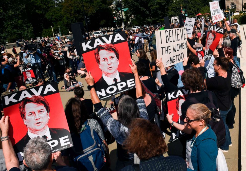 PHOTO: Demonstrators protesting Judge Brett Kavanaughs nomination to the Supreme Court hold signs in front of the Supreme Court in Washington after allegations of sexual assault, Sept. 28, 2018.