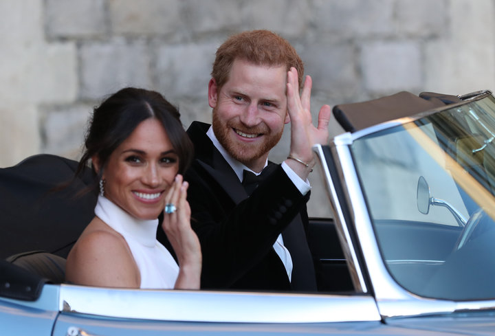 The Duke and Duchess of Sussex on their way to the evening wedding reception on May 19.&nbsp;