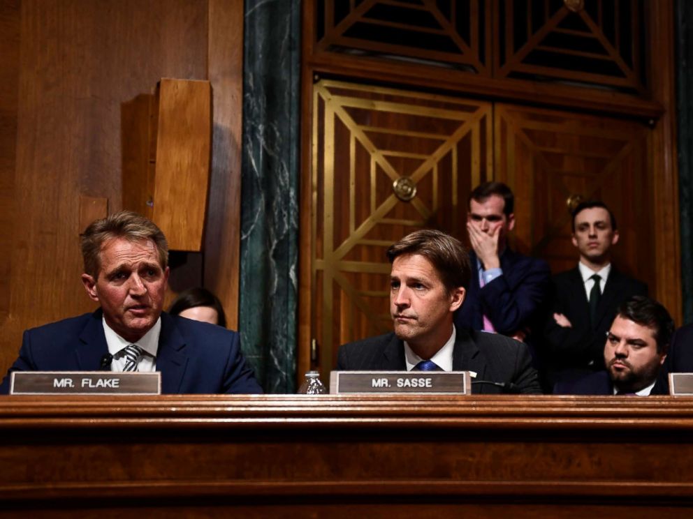 PHOTO: Senate Judiciary Committee member Republican Jeff Flake, left, speaks during a hearing on Capitol Hill in Washington on Sept. 28, 2018, on the nomination of Brett Kavanaugh to the Supreme Court. 