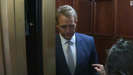 Flake confronted by two female protesters after announcing he&#39;ll back Kavanaugh