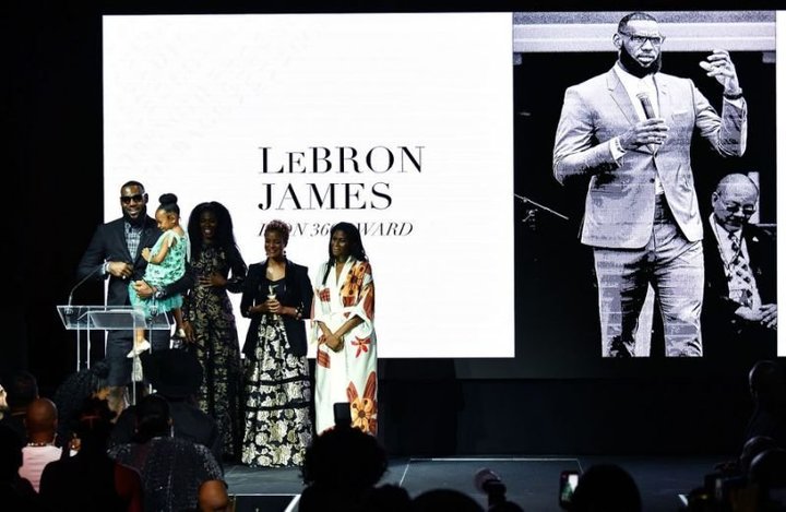 LeBron James accepts the Icon360 award from Harlem&rsquo;s Fashion Row on Tuesday night.