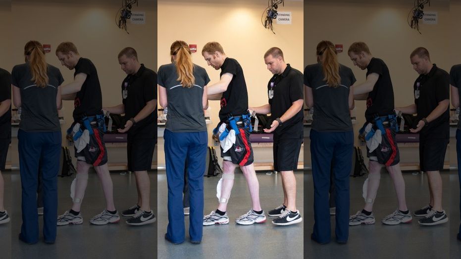 May 22, 2018: Jeff Marquis of Louisville, Ky., is helped by his physical therapist. 